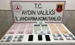 Dolandırıcı 3 şüpheliyi jandarmadan kaçamadı