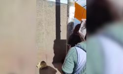 Genç kadın, esnaf tarafından soyularak direğe bağlandı