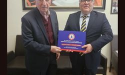 Cumhurbaşkanlığı Yüksek İstişare Kurulu Üyesi Köksal Toptan, Rektör Özölçer'i makamında kabul etti