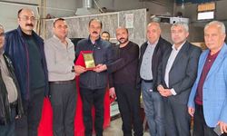 Fazla yardımı kabul etmeyen esnafa örnek davranış plaketi