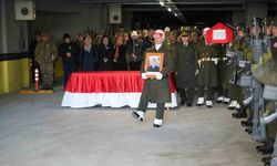 Türk bayrağına sarılı naaşıyla memleketine uğurlandı