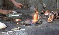 İkiz kardeşler baba mesleğini yaşatıyor