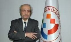 Üniversitenin lojmanında ölü bulundu