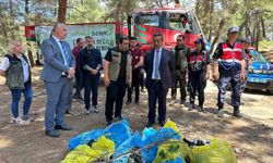 Burhaniye'de orman yangınlarına karşı ormanda çöp toplama etkinliği yapıldı