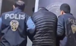 İzmir'de 50 yıl hapis cezasıyla aranan şüpheli gardıropta yakalandı