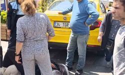 Şişli'de geri geri giden taksi, yaşlı kadını altına aldı