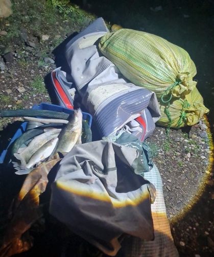 Kaçak balık avı yapan şahıslar fotokapana yakalandı